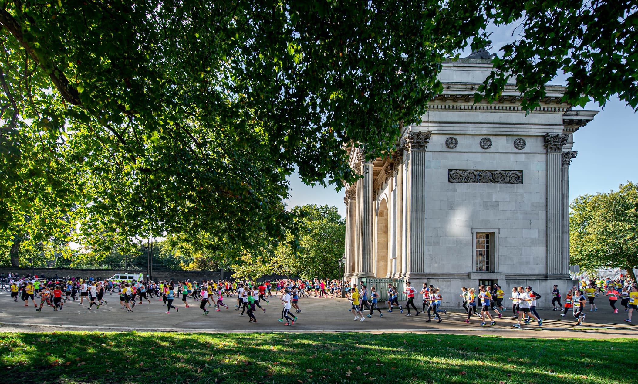 Lots of runners in a park